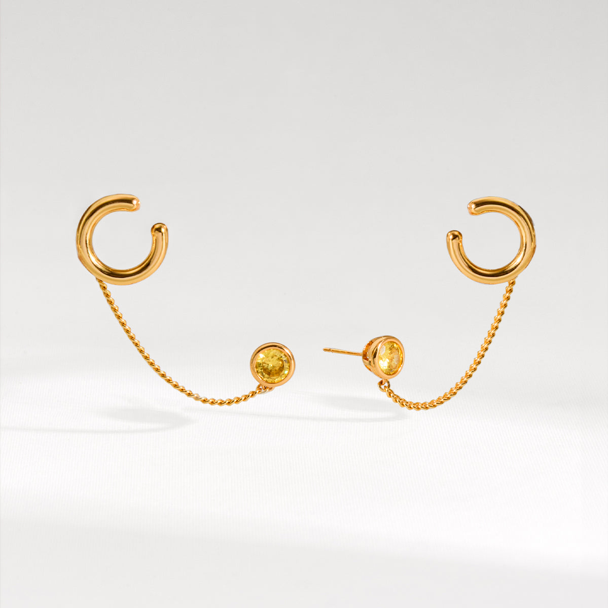 BRINCO PIERCING OLHO GIPSY DOURADO